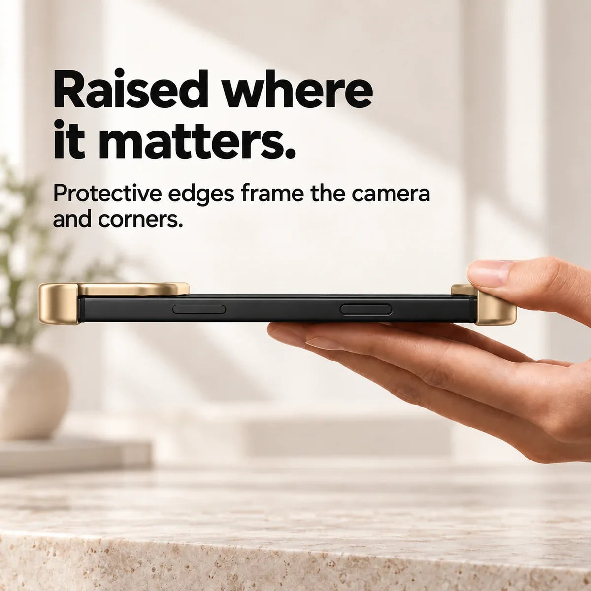Gold metal phone bumper in a horizontal side view showing raised end protection #color_Champagne Gold